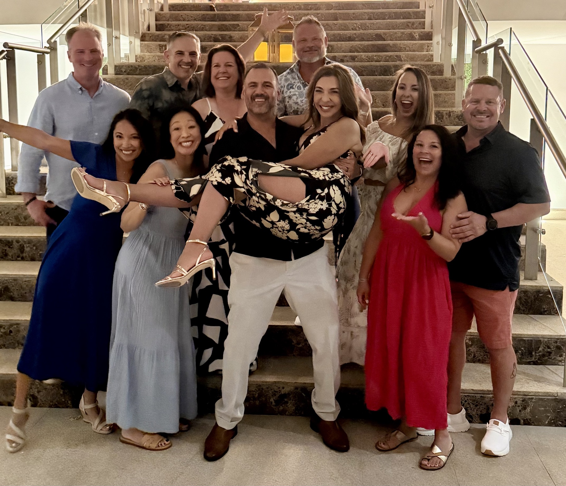 The whole crew on the resort staircase