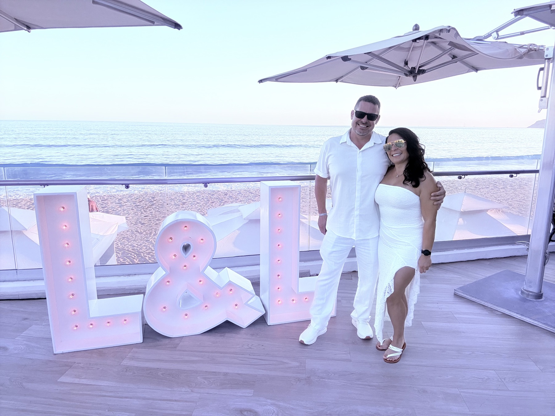 By the L&L letters above the beach