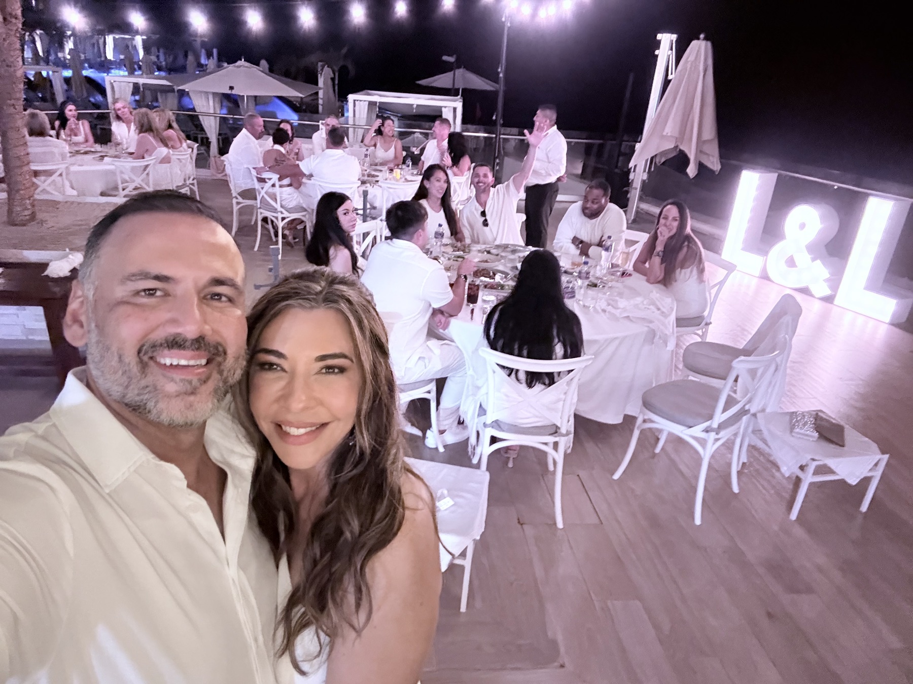 Selfie in front of the white party and the L&L marquee