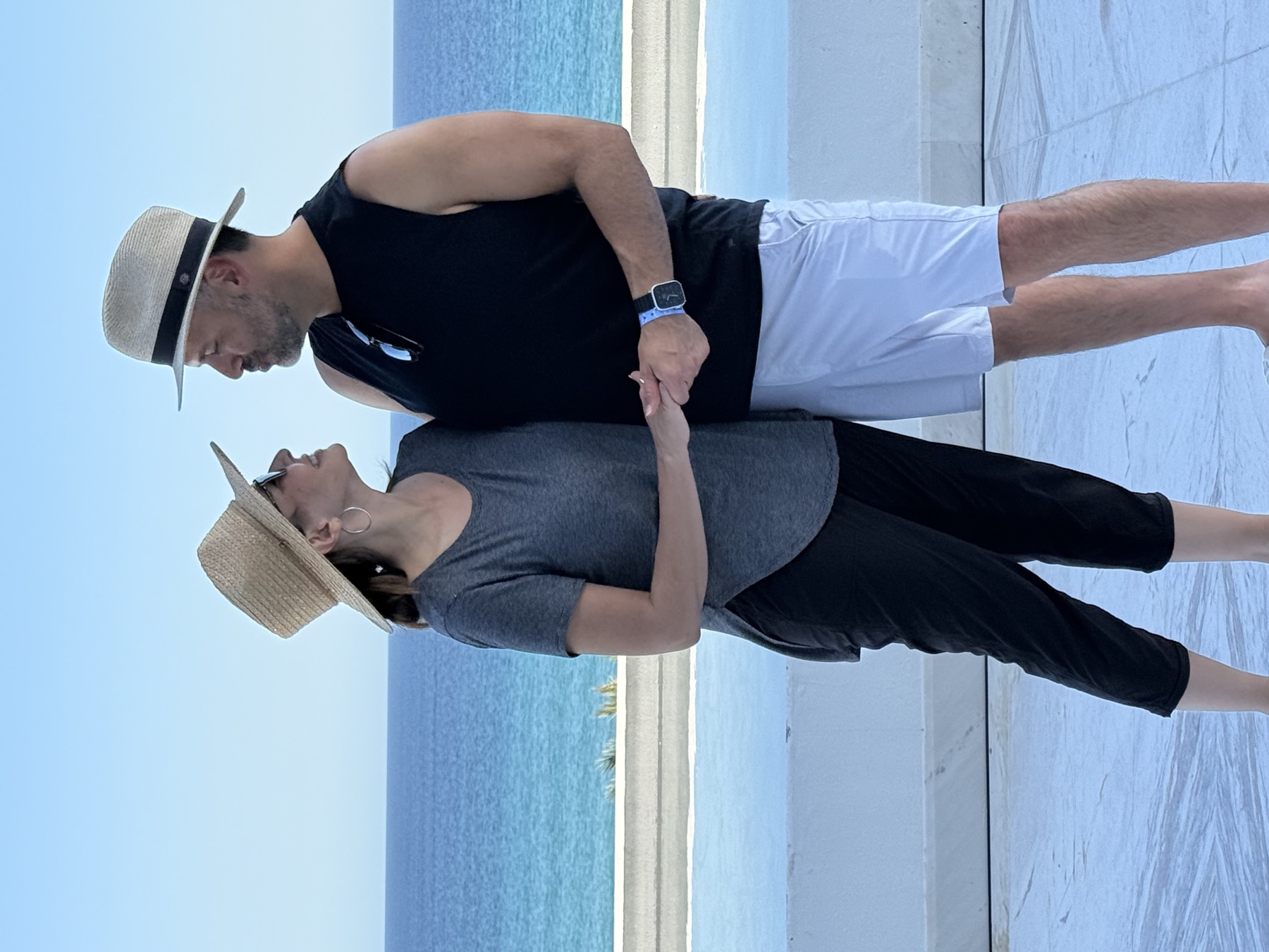 Lorenzo and Lisa in hats by the Sea of Cortez